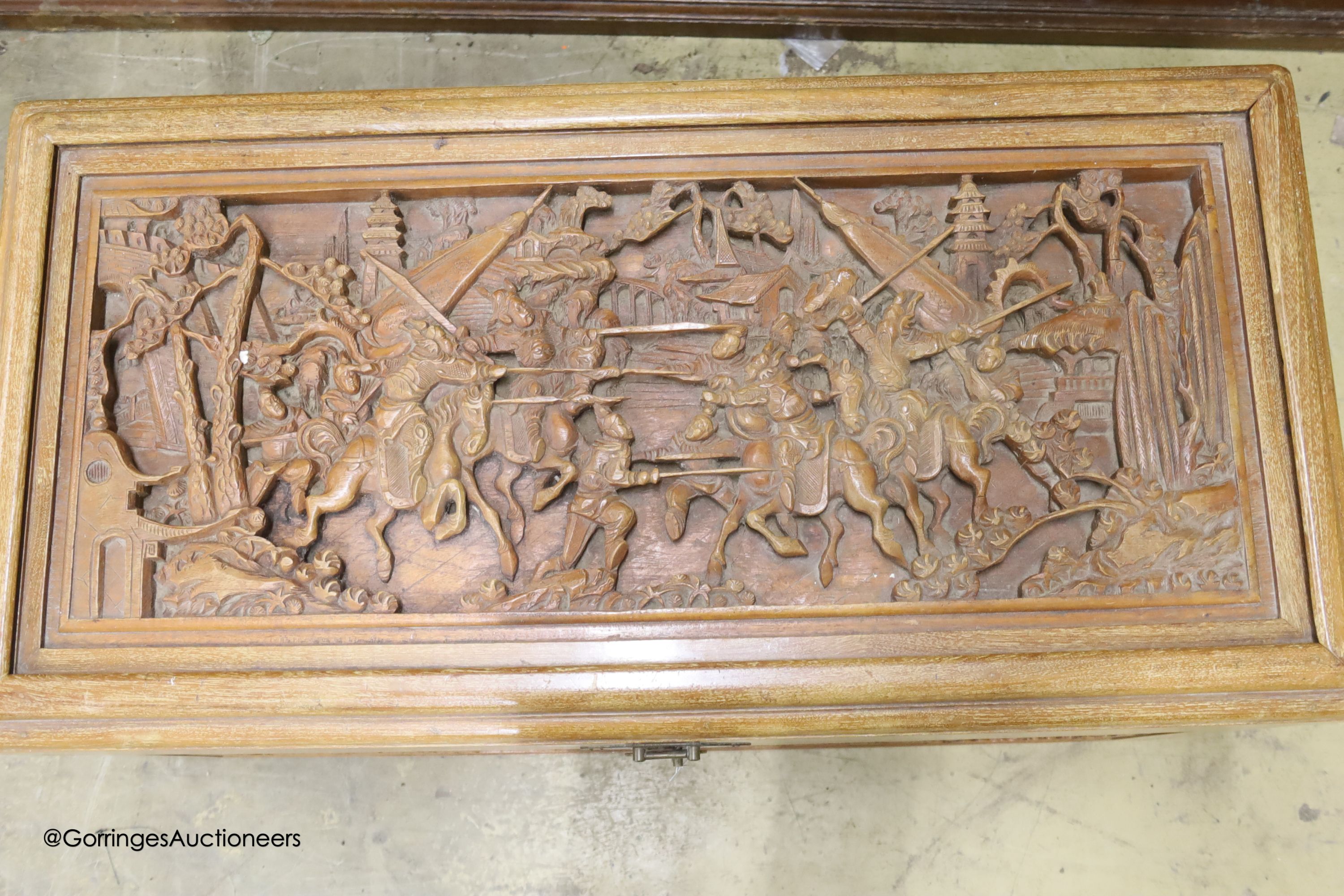 A Chinese carved camphorwood chest, length 100cm, depth 50cm, height 50cm